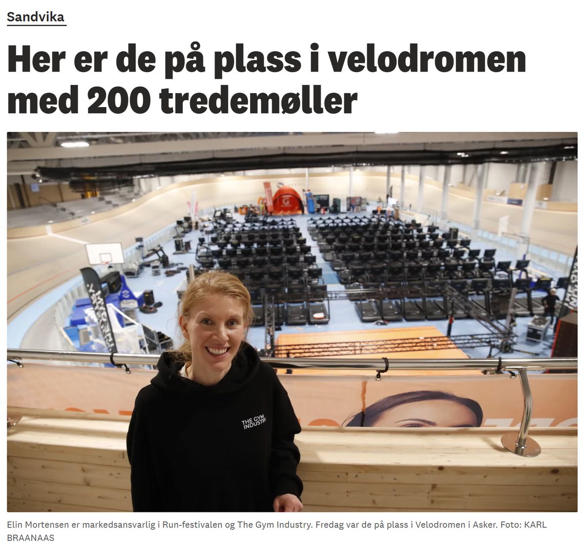 Faksimile fra Budstikka: «Her er de på plass i velodromen med 200 tredemøller», med bilde av Elin Mortensen foran tredemøllene i Velodromen i Asker